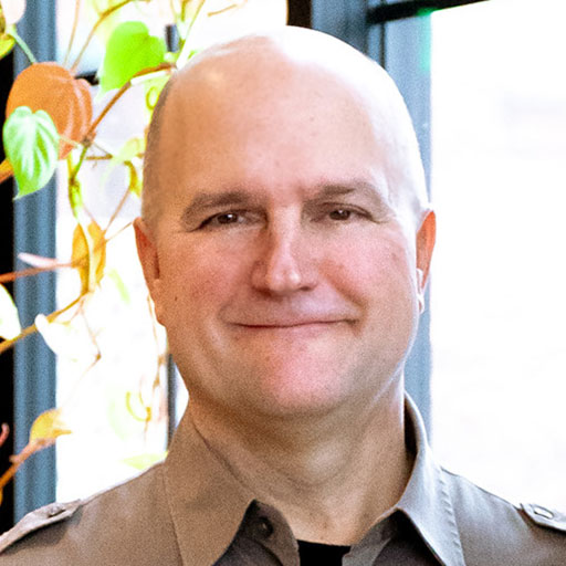 Photo of Carl Severance, Senior Graphic Designer and Multimedia Manager at Stanford Taylor Foundation.