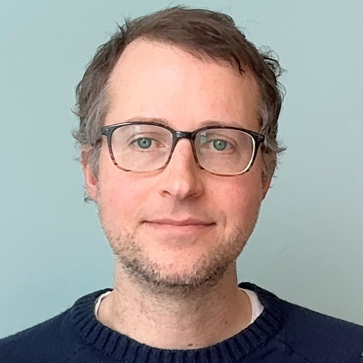 Photo of Chandler Escude, Senior Software Engineer at Stanford Taylor Foundation.