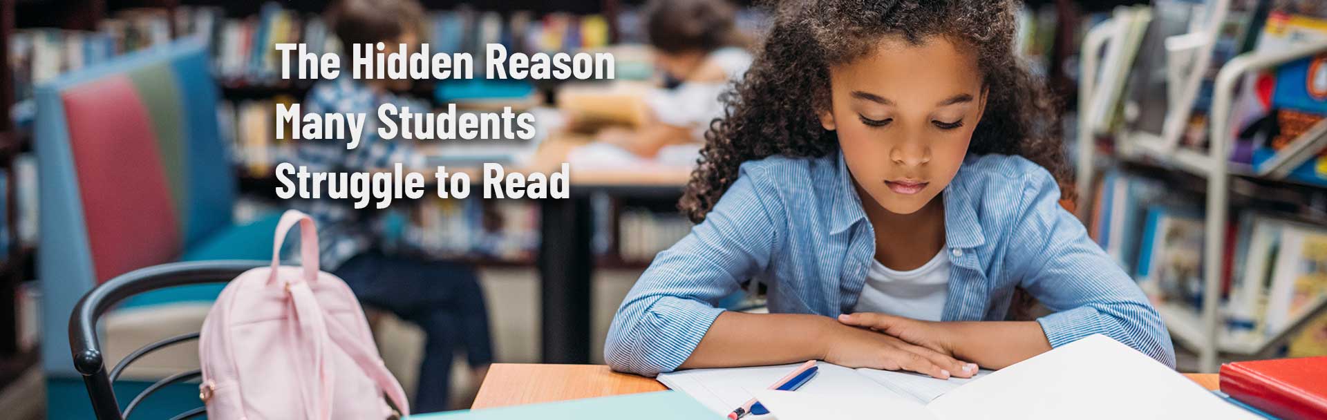 Female elementary school student reading a book in a library. Text on the image says, "The hidden reason many students struggle to read well."